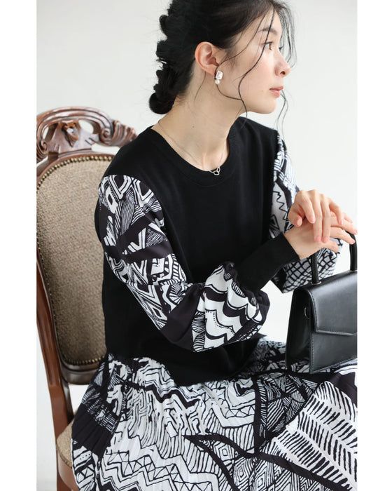 モノトーンなアートが広がるドッキングニットロングワンピース