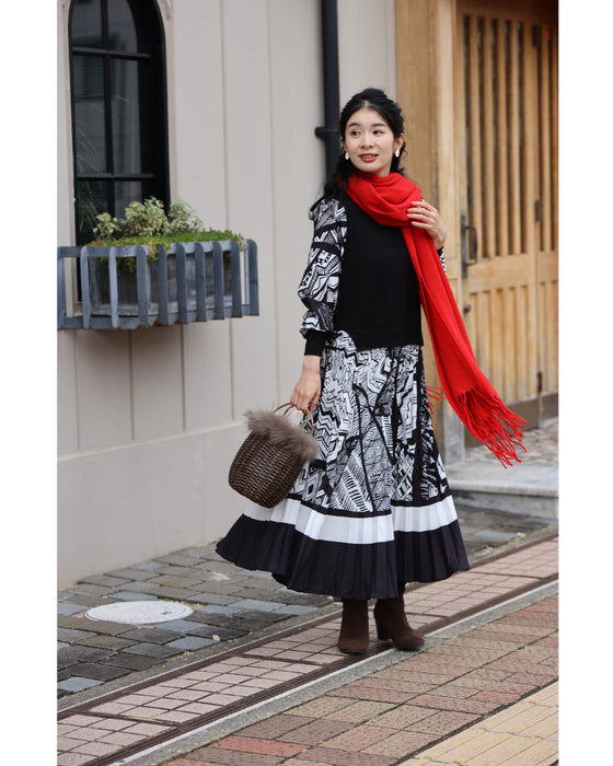 モノトーンなアートが広がるドッキングニットロングワンピース