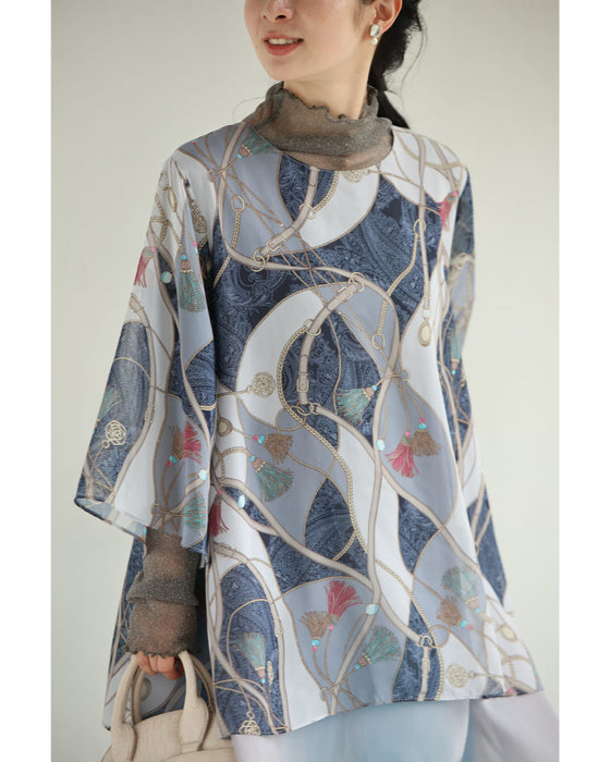 重なるデザインのスカーフ柄エアリーチュニック