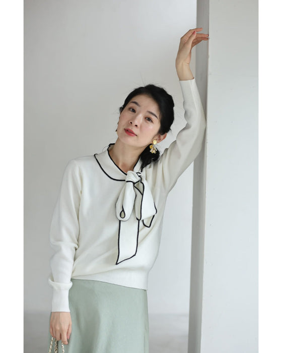 縁取りリボンネックのニットプルオーバートップス