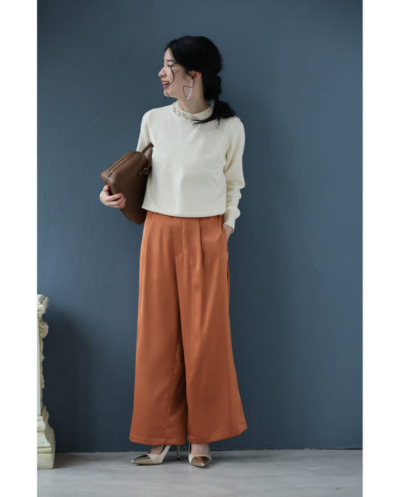 アシンメトリーなビジューネックニットプルオーバートップス（ブローチ付き）