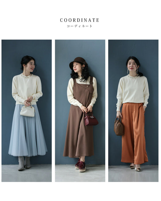 アシンメトリーなビジューネックニットプルオーバートップス（ブローチ付き）