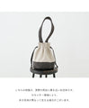 A cute and round suede drawstring bag