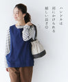 A cute and round suede drawstring bag