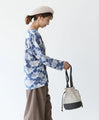 A cute and round suede drawstring bag