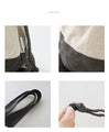 A cute and round suede drawstring bag