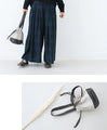 A cute and round suede drawstring bag