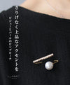 A subtle and elegant accent with a jewel and pearl pin brooch