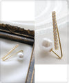 A subtle and elegant accent with a jewel and pearl pin brooch