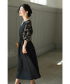 Black tuck dress with floral lace sleeves (black)