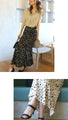 Be stylish with just one item! Glossy irregular polka dot skirt
