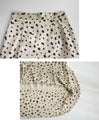 Be stylish with just one item! Glossy irregular polka dot skirt