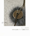 A fluffy, mature and cute Y-shaped fur necklace in grey