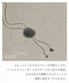 A fluffy, mature and cute Y-shaped fur necklace in grey