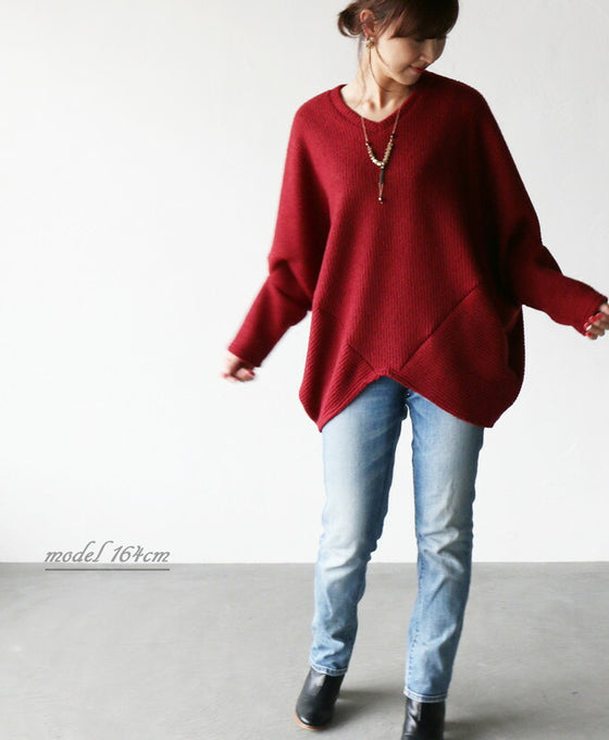 A loose-fitting adult modified dolman top in red