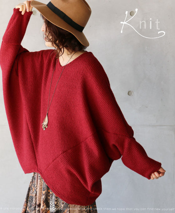 A loose-fitting adult modified dolman top in red