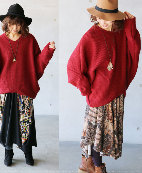 A loose-fitting adult modified dolman top in red