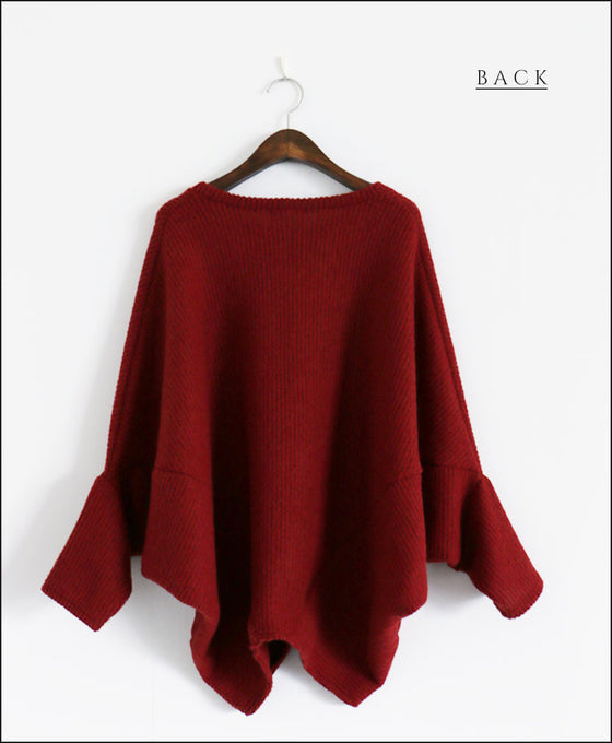 A loose-fitting adult modified dolman top in red