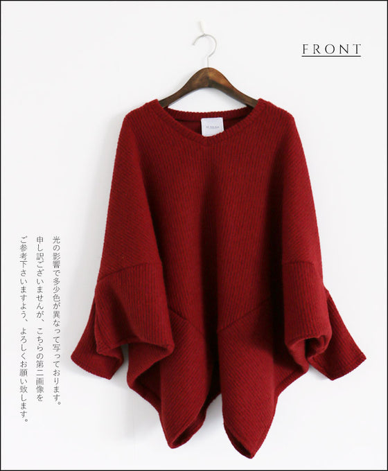 A loose-fitting adult modified dolman top in red