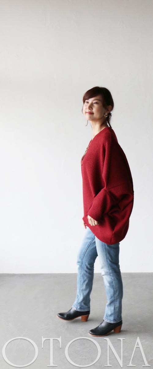 A loose-fitting adult modified dolman top in red