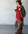 A loose-fitting adult modified dolman top in red