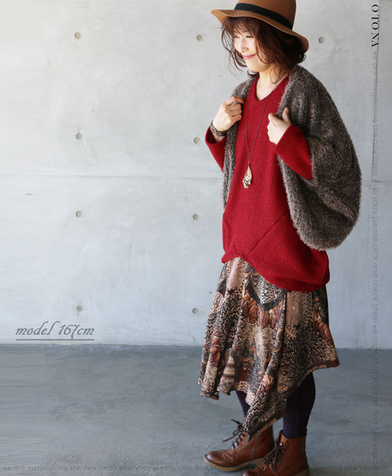 A loose-fitting adult modified dolman top in red