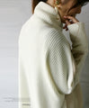 A sophisticated knit top with a mix of different materials in beige