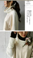 A sophisticated knit top with a mix of different materials in beige