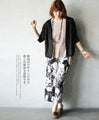 Light and airy, with a feminine sheerness. Hooded cardigan.