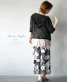 Light and airy, with a feminine sheerness. Hooded cardigan.
