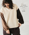 Puffy V-neck knit with two-color sleeves for extra cuteness! 