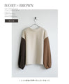 Puffy V-neck knit with two-color sleeves for extra cuteness! 