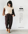 Puffy V-neck knit with two-color sleeves for extra cuteness! 