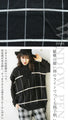 A loose knit vest that is both eye-catching and elegant