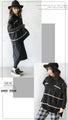 A loose knit vest that is both eye-catching and elegant