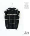 A loose knit vest that is both eye-catching and elegant