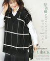 A loose knit vest that is both eye-catching and elegant