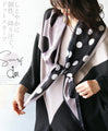 A dot scarf that will brighten your mood.