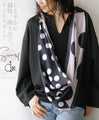 A dot scarf that will brighten your mood.