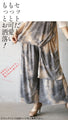 Feminine and mature. A tank top with a design that has a mature dyed look.