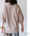 The fluffy sleeves make it cute for everyday wear!