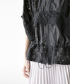 Captivating with lace. Beautiful blouson in black