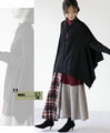 Perfectly functional and stylish, the deformed knit cardigan 