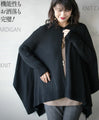 Perfectly functional and stylish, the deformed knit cardigan 