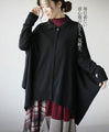 Perfectly functional and stylish, the deformed knit cardigan 