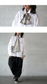 Take your style to the next level with a single scarf: Gray