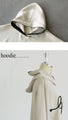 A playful 3D logo. A new hooded dolman top that feels great against your bare skin (beige)