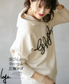 A playful 3D logo. A new hooded dolman top that feels great against your bare skin (beige)