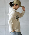 A playful 3D logo. A new hooded dolman top that feels great against your bare skin (beige)