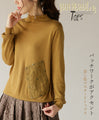 Patchwork accents in mustard color top 